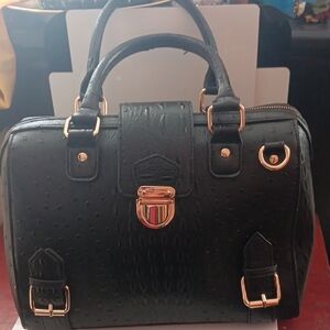 Elegant Black Satchel with Gold Hardware